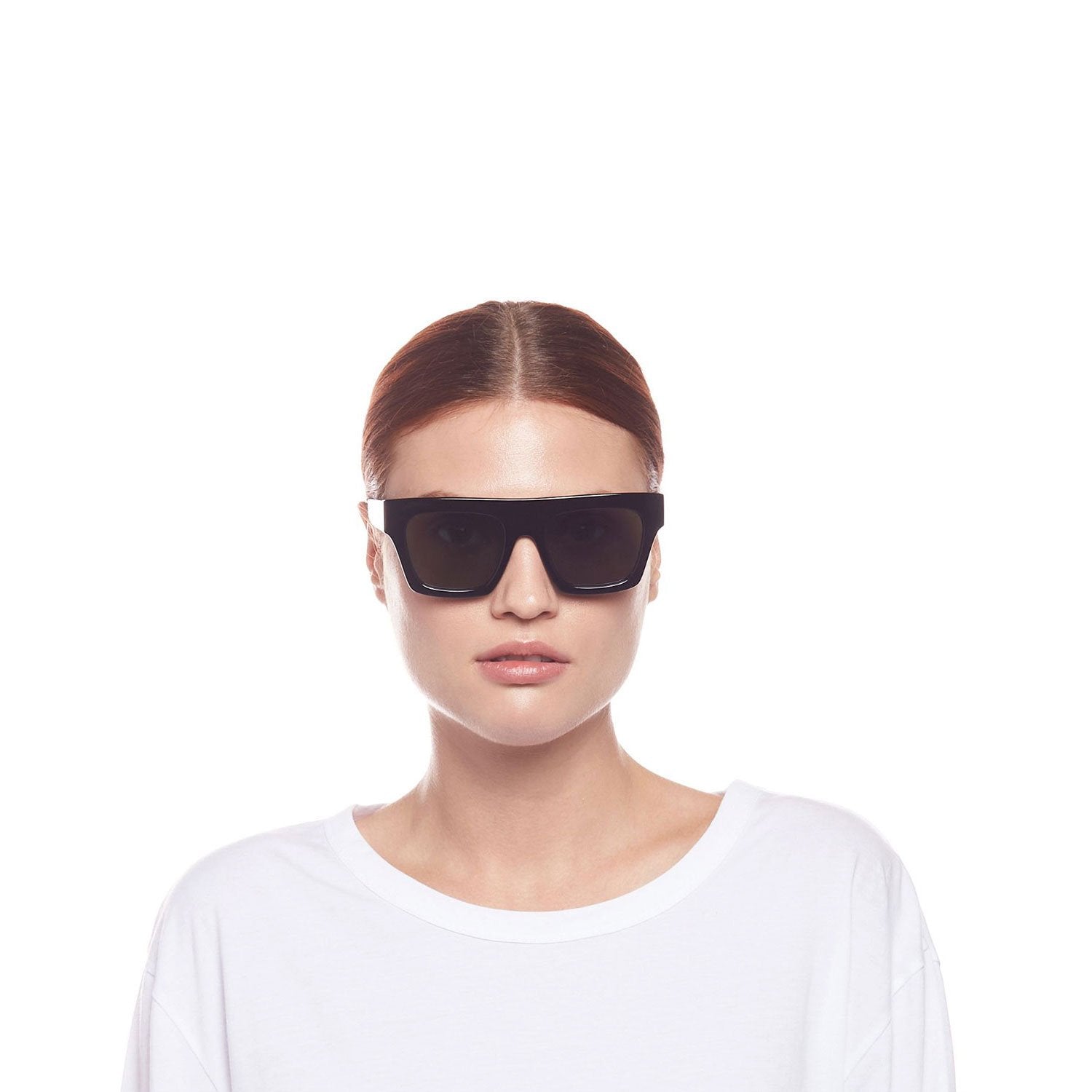UNIKONCEPT Lifestyle Boutique and Lounge; Le Specs Subdimension sunglasses in Black on a model