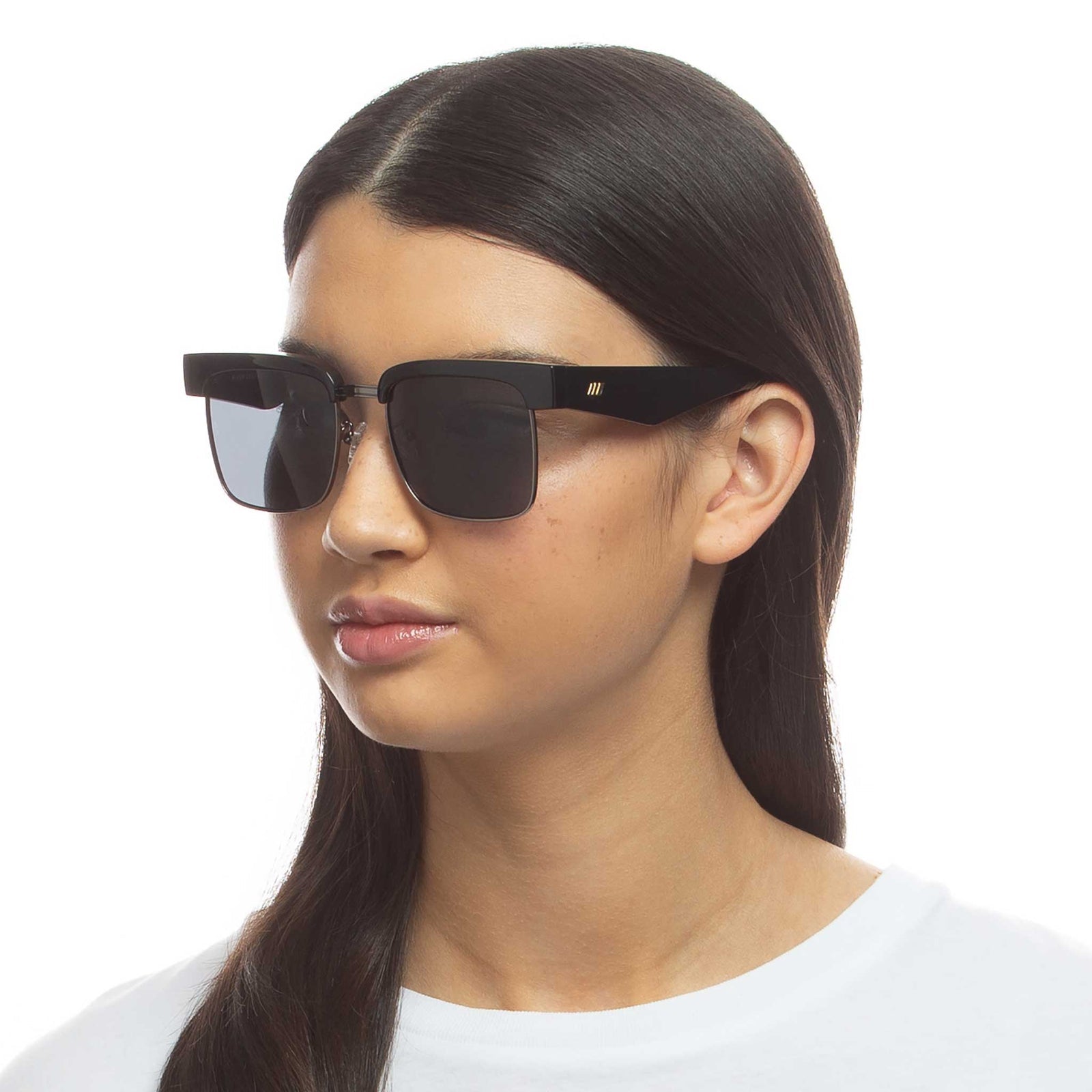 UNIKONCEPT Lifestyle Boutique and Lounge; Le Specs River Deep black and gunmetal sunglasses pictured on a model