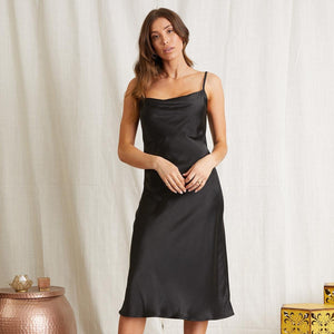 UNIKONCEPT Lifestyle Boutique and Lounge; Model wearing Emery Slip Dress by Scandal Italy in black
