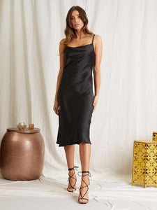 UNIKONCEPT Lifestyle Boutique and Lounge; Model wearing Emery Slip Dress by Scandal Italy in black