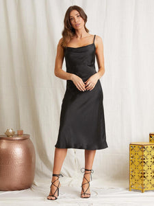 UNIKONCEPT Lifestyle Boutique and Lounge; Model wearing Emery Slip Dress by Scandal Italy in black