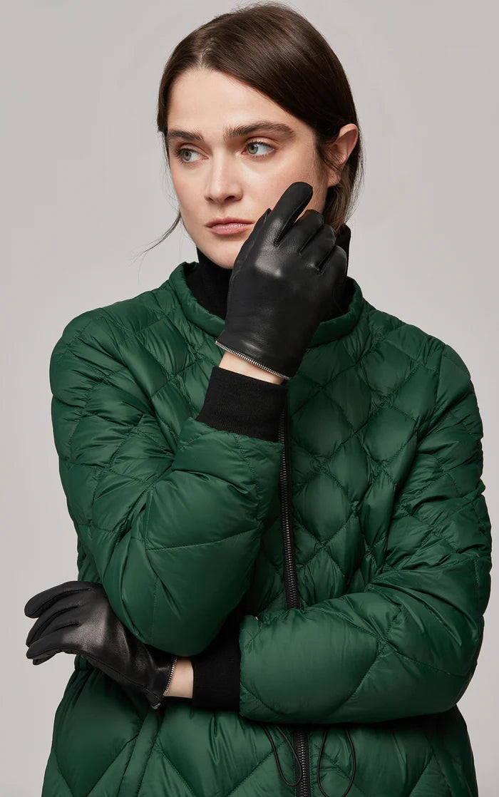 UNIKONCEPT Lifestyle Boutique and Lounge; Model wearing Soia & Kyo Demy Gloves in black featured on a white background - black leather gloves with zipper detail and luxe faux fur interior