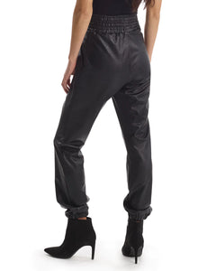 UNIKONCEPT Lifestyle Boutique and Lounge; Commando Faux Leather Smocked Jogger in Black pictured on a model