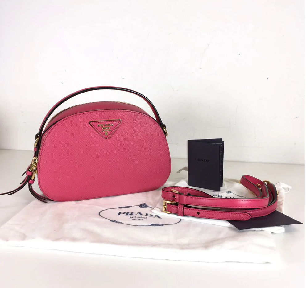 LULUX-The Luxury Hub - Prada Women Odette Saffiano Leather Bag-Black  https://luxbag.co/product/prada-women-odette-saffiano-leather-bag-black/ |  Facebook