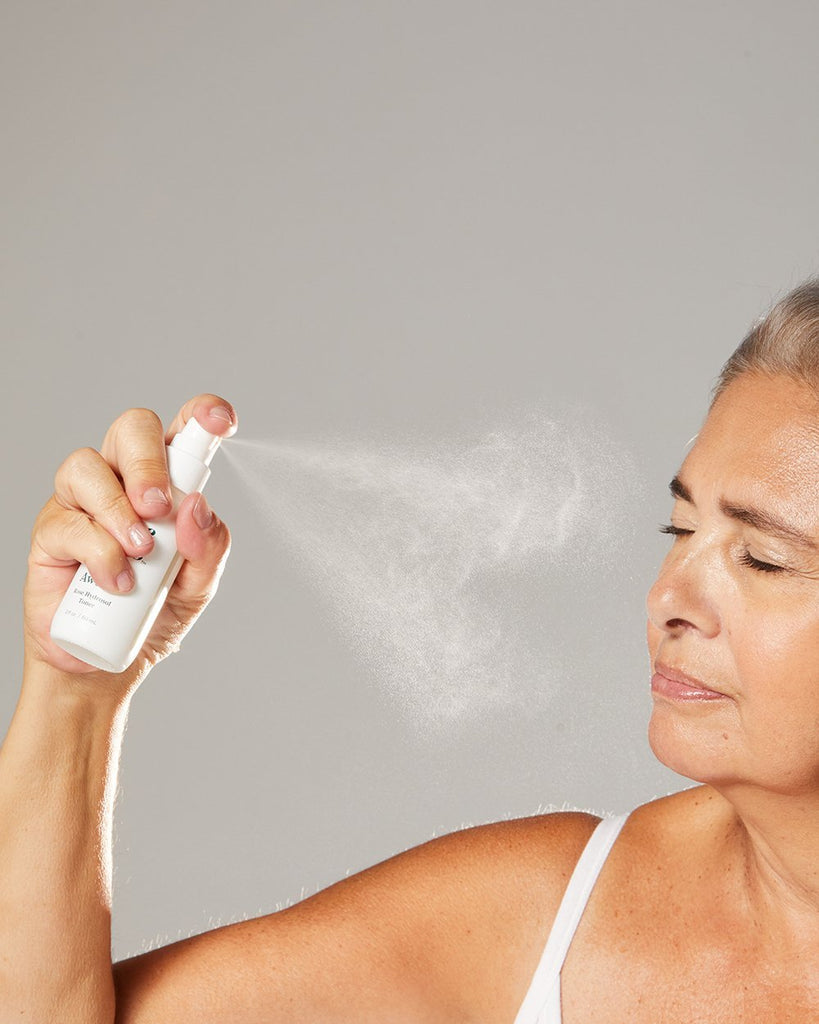 Woman using Three Ships Awake Rose Hydrosol Toner 
