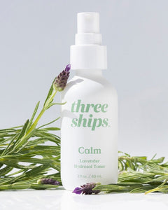 Three Ships Calm Lavender Hydrosol Toner pictured on a white background with lavender sprigs as decor 