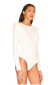 UNIKONCEPT Lifestyle Boutique and Lounge; Arabella tie-back cutout bodysuit by ASTR the Label. White ribbed bodysuit with back tie detail and open back. Shoulder pads.