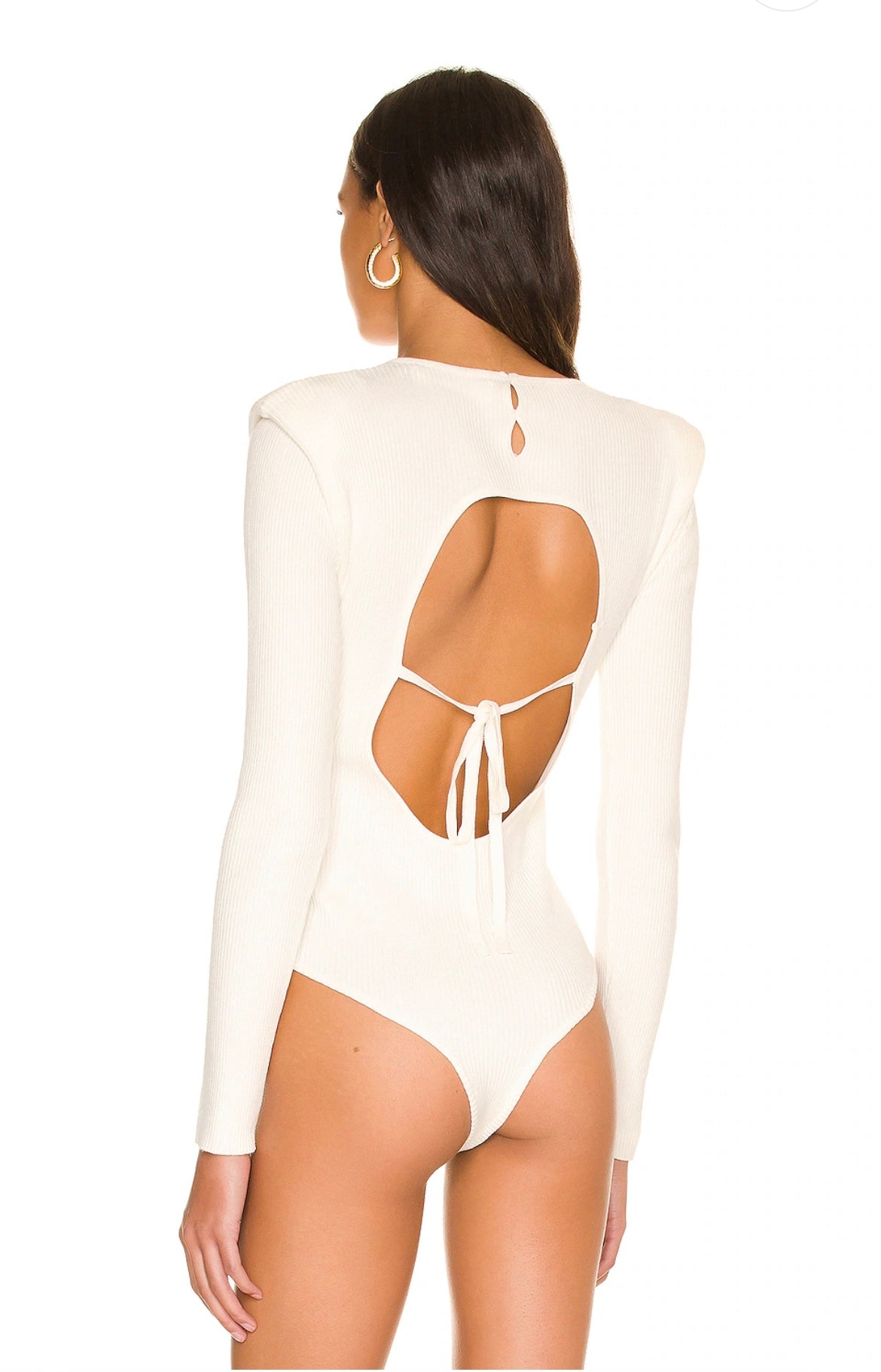 UNIKONCEPT Lifestyle Boutique and Lounge; Arabella tie-back cutout bodysuit by ASTR the Label. White ribbed bodysuit with back tie detail and open back. Shoulder pads.