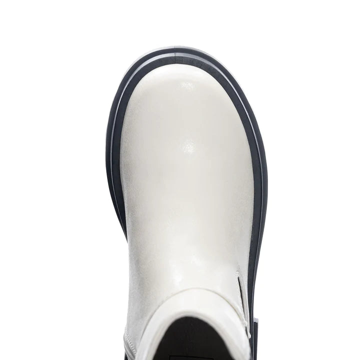 Top view of Chinese Laundry Vines Bootie toe: A white vegan leather Chelsea boot.