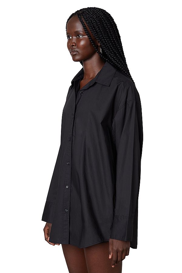 Model wearing Leanne Oversized Button Up in Black from NIA available at UniKoncept in Waterloo